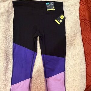 Brand new Women’s large black and Purple Leggings